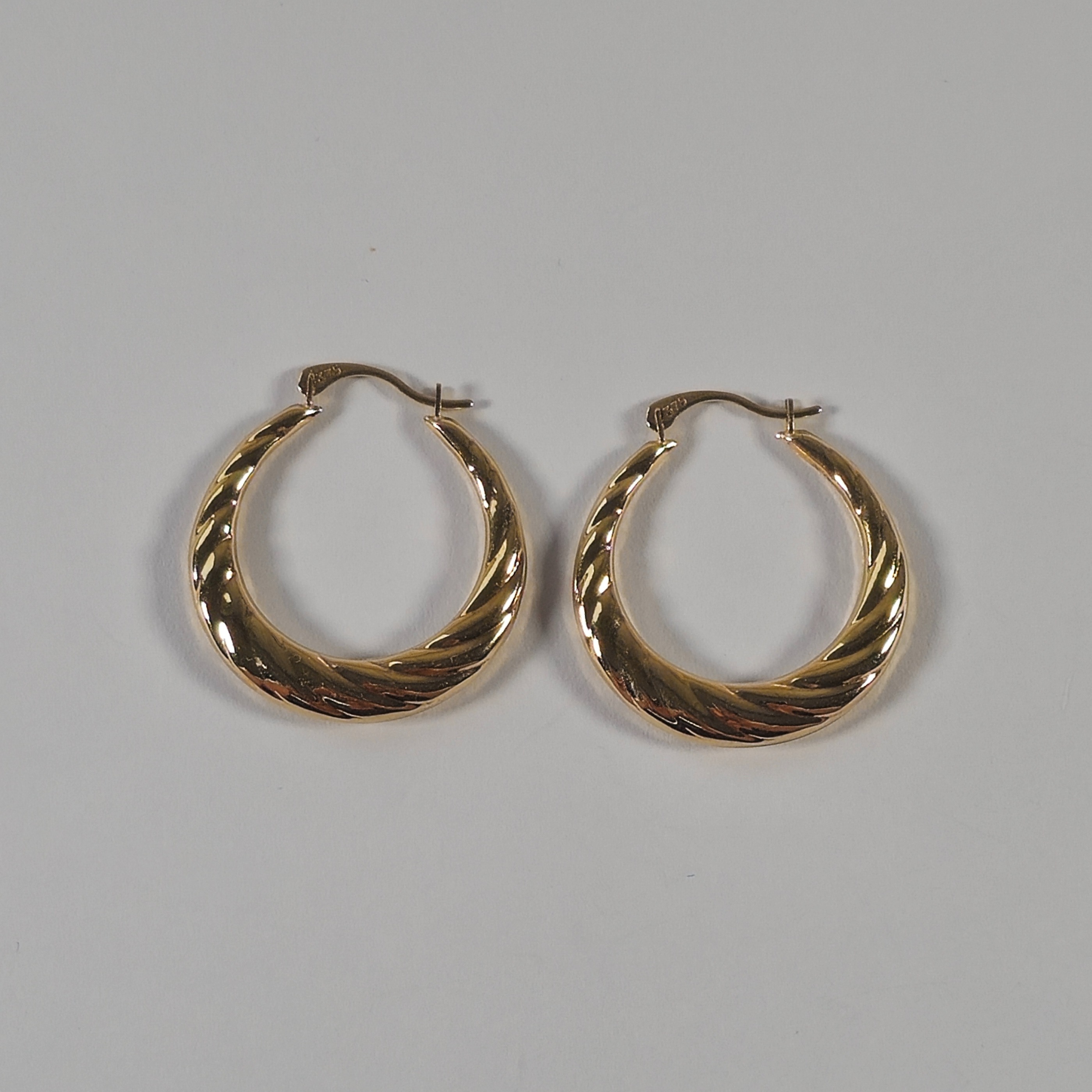 Product photo for 9ct Gold Twisted Moon Hop Earrings