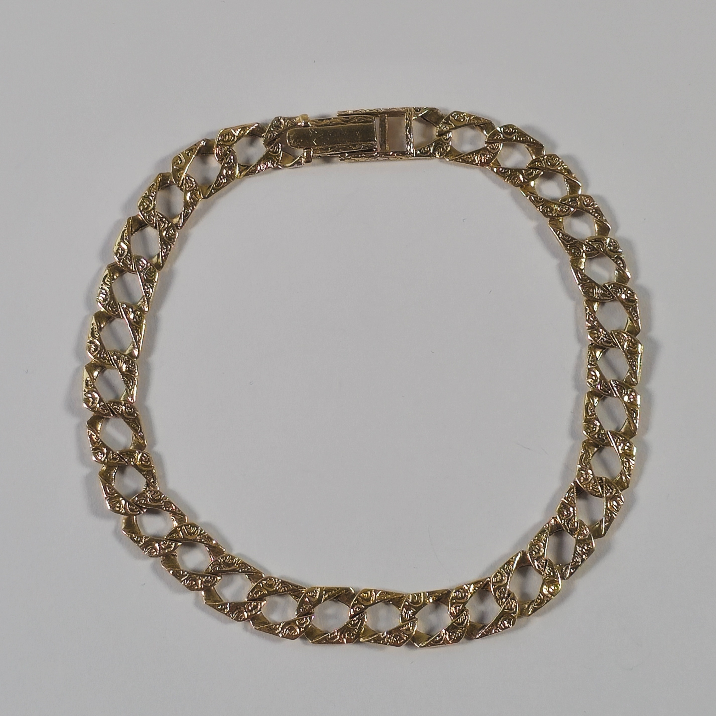 Product photo for 9ct Gold Hexagon Curb Link with Pattern Bracelet 8.2