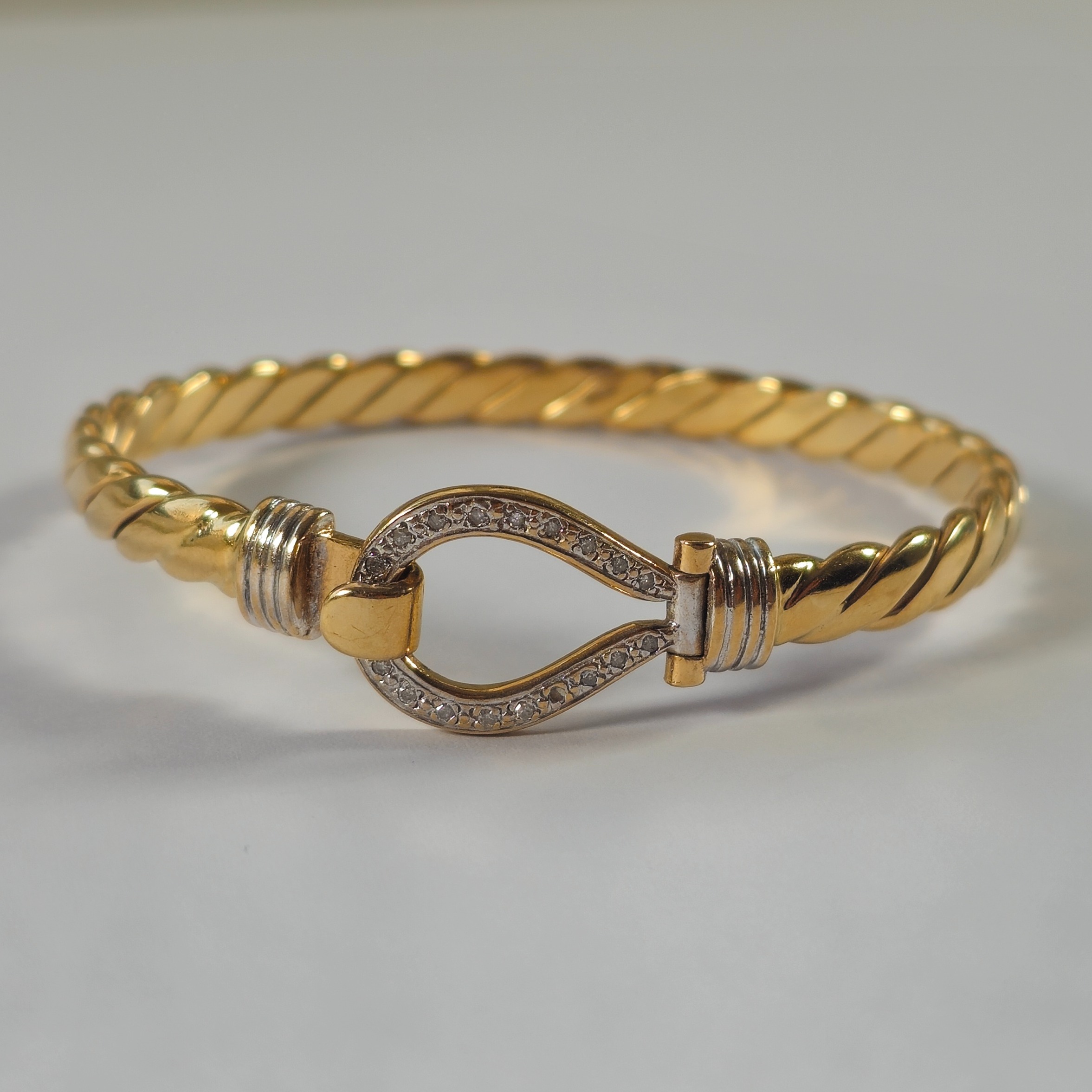 Product photo for 9ct Gold Diamond Buckle Bangle