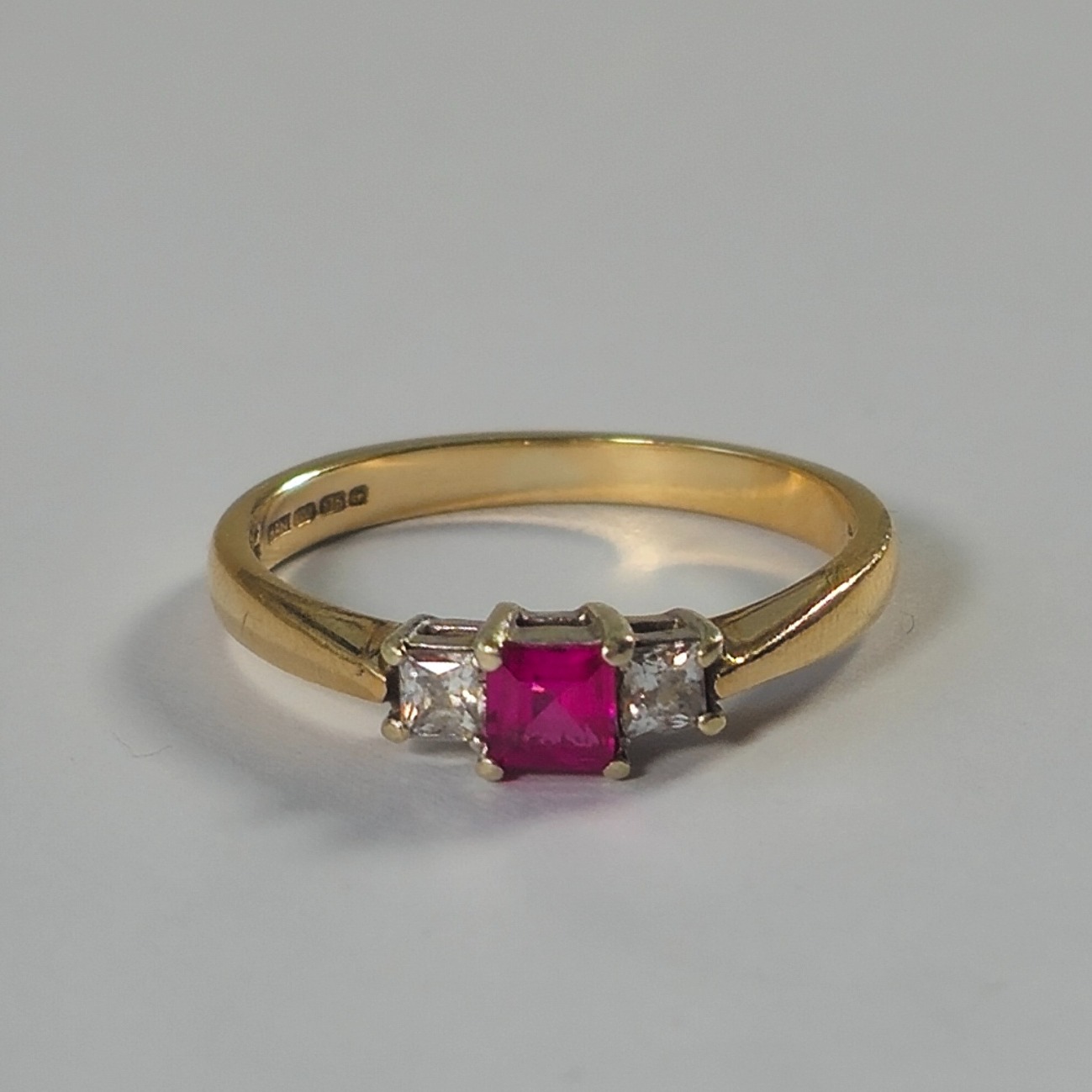 Product photo for 9ct Gold Synthetic Ruby & *CZ* Trilogy Ring Size N