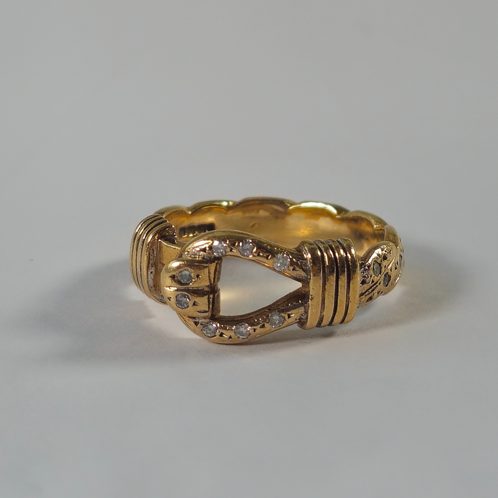 Product photo for 9ct Gold Diamond Buckle Ring Size P