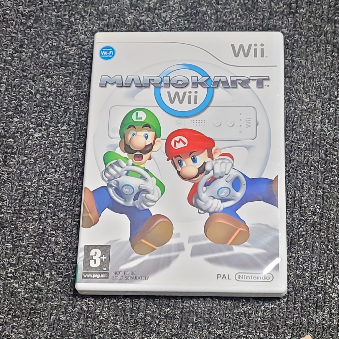Product photo for Nintendo Wii Nintendo Wii Game: MarioKart