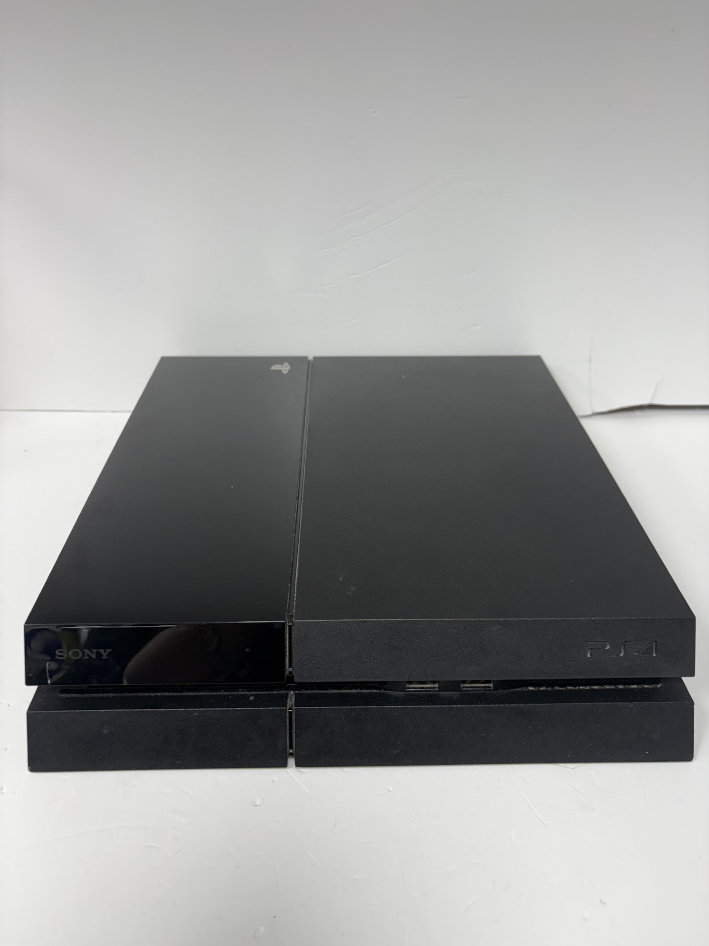 Product photo for Ps4 original 500gb black with wires and controller unboxed
