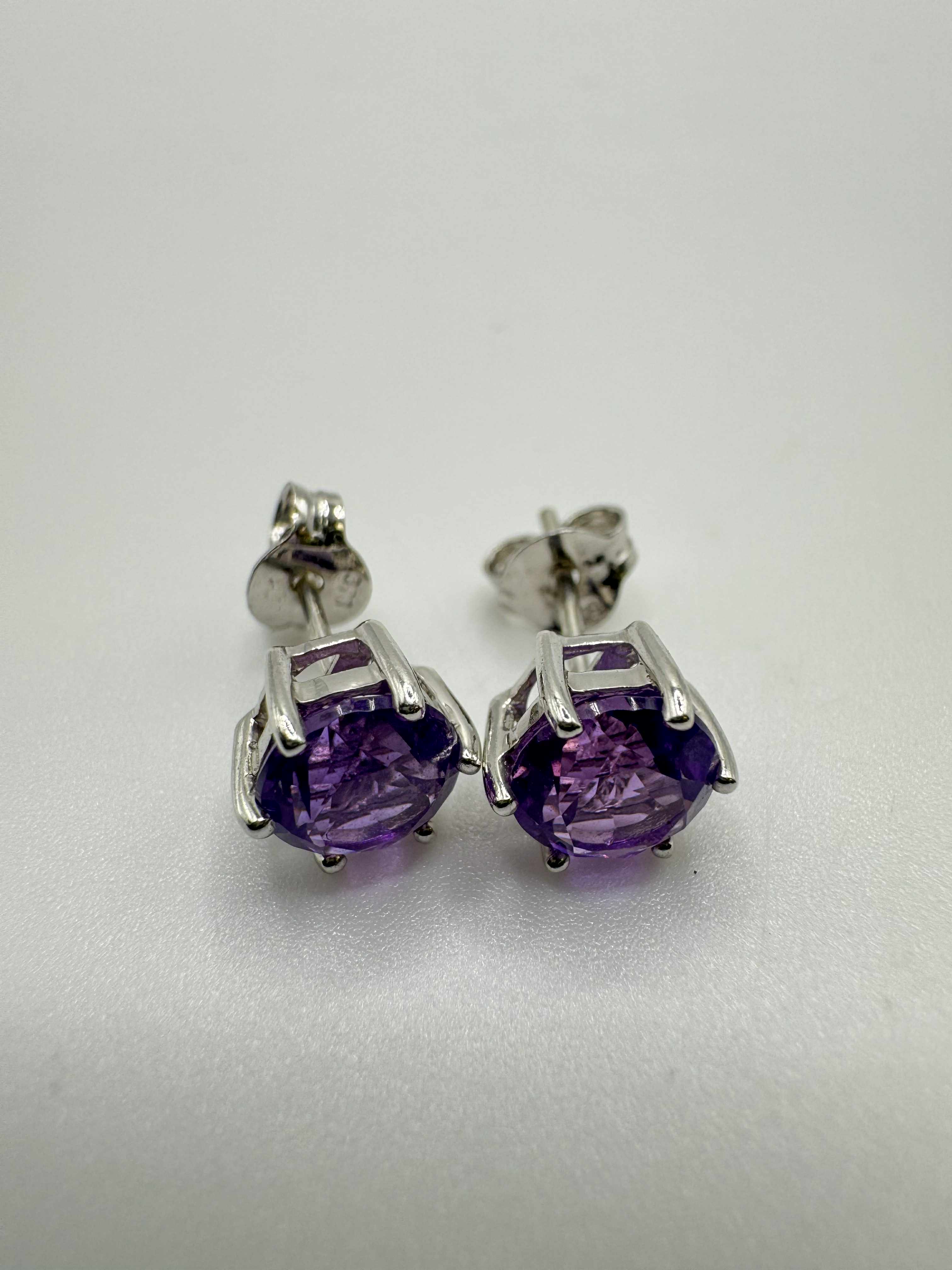 Product photo for 9ct White Gold Amethyst Stud Earrings