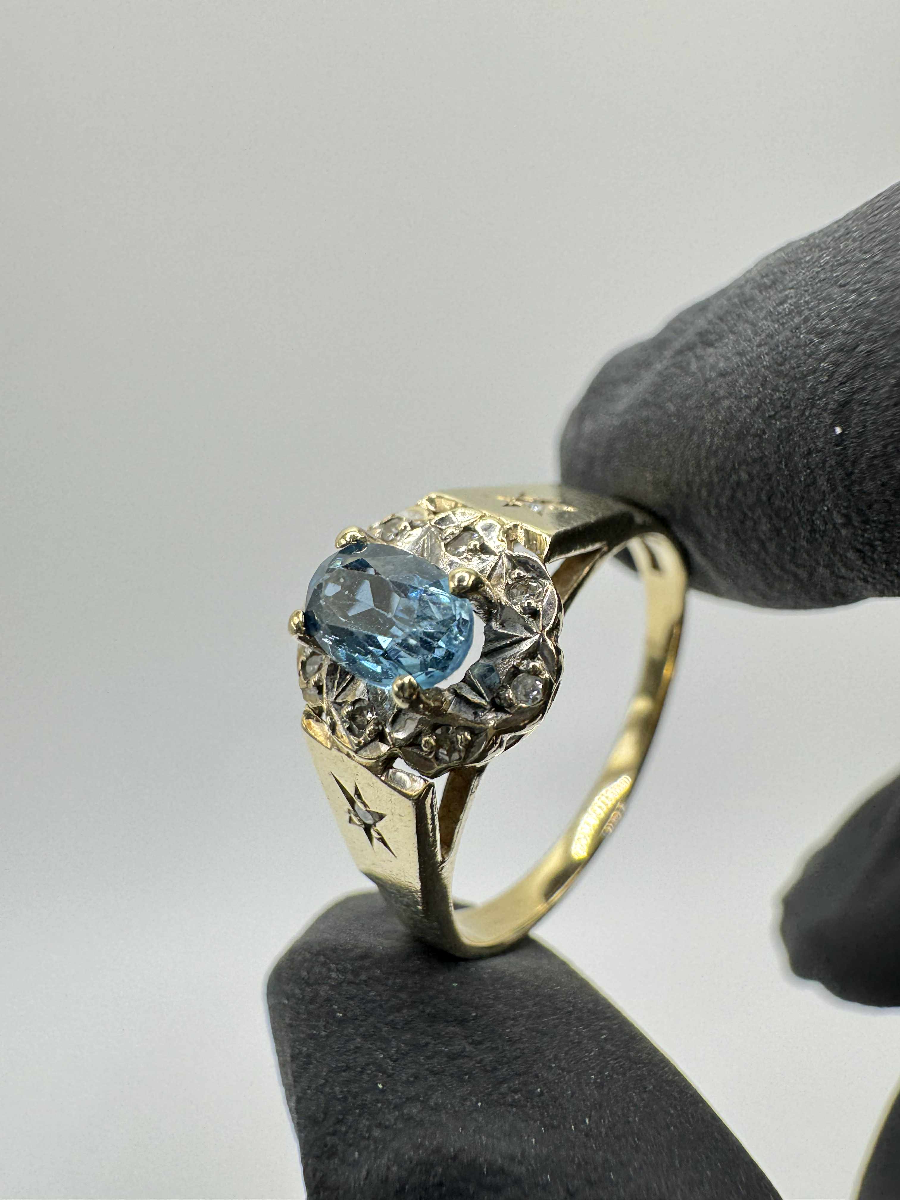 Product photo for 9ct Blue Topaz & Diamond Halo Cluster Ring