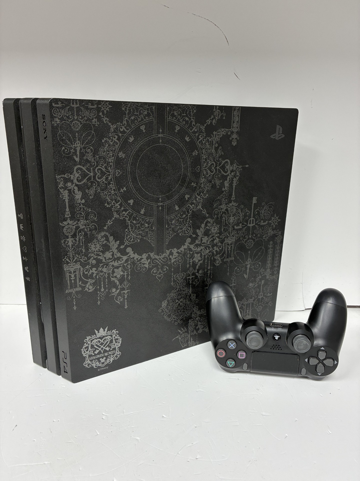 Product photo for ps4 pro kingdom hearts edition 1tb black unboxed