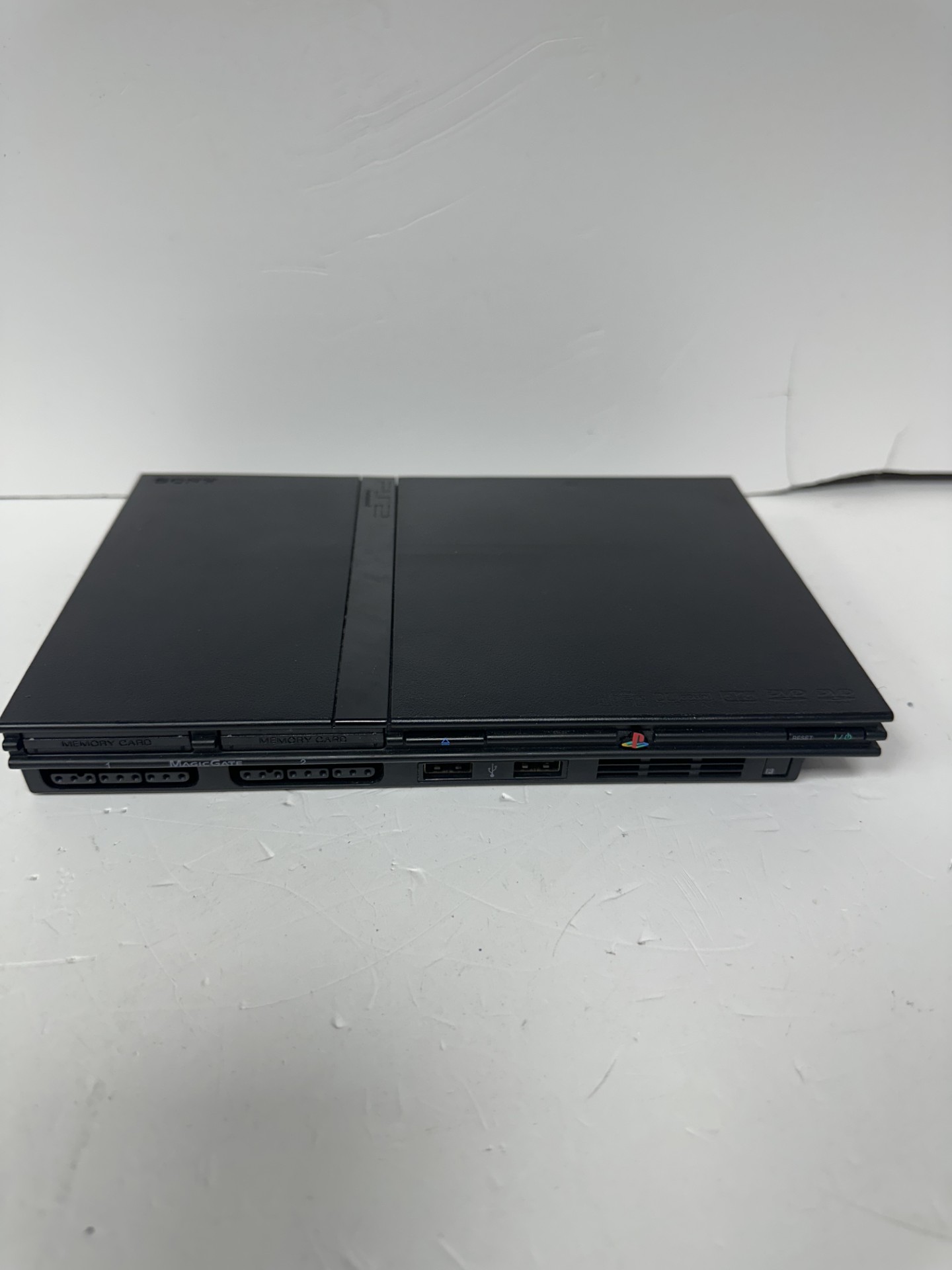 Product photo for PlayStation 2 console with wires black unboxed
