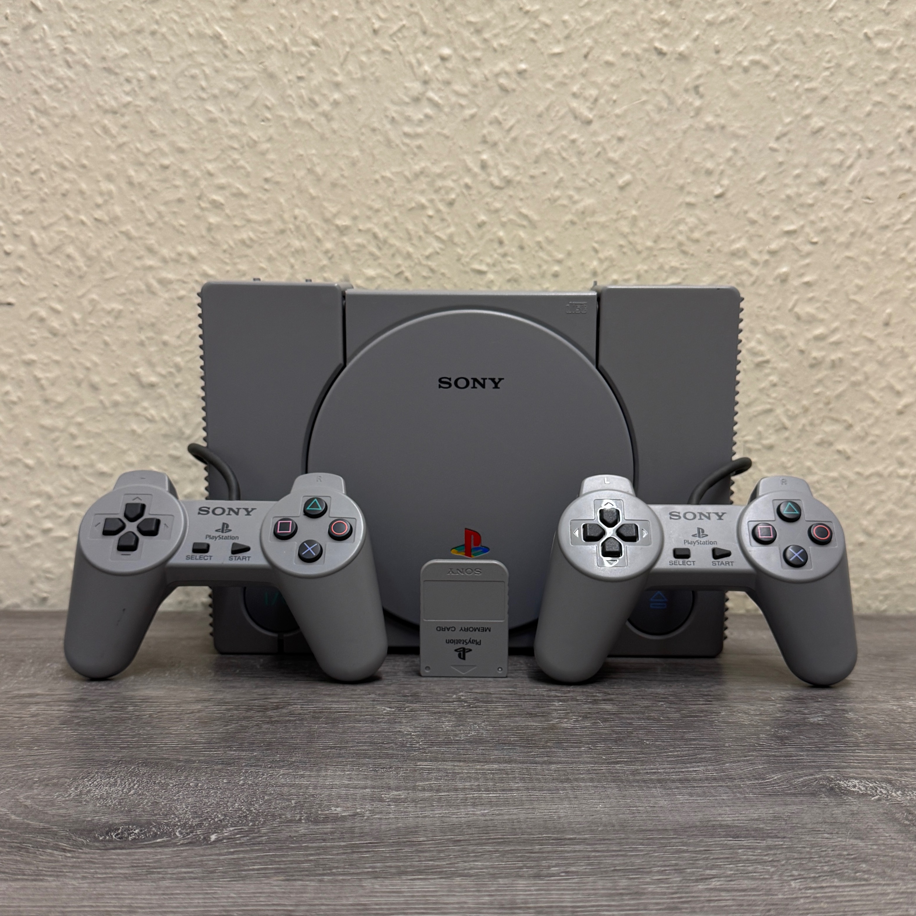 Product photo for SONY PLAYSTATION ONE SCPH-5552 WITH 2 X CONTROLLER & MEMORY CARD