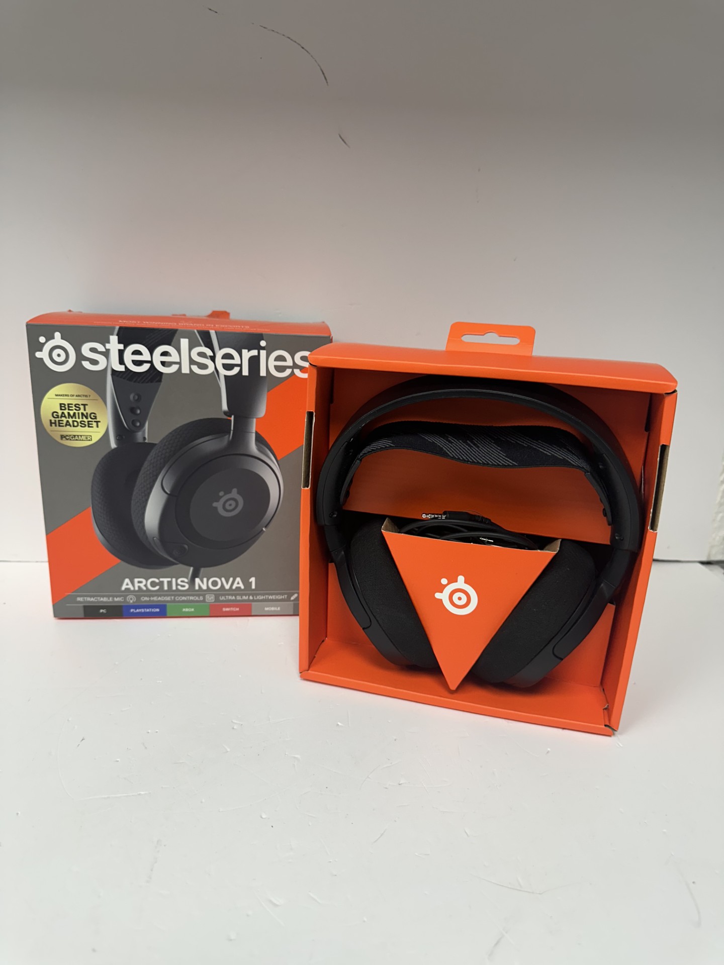 Product photo for steelseries arctis nova 1 headset boxed