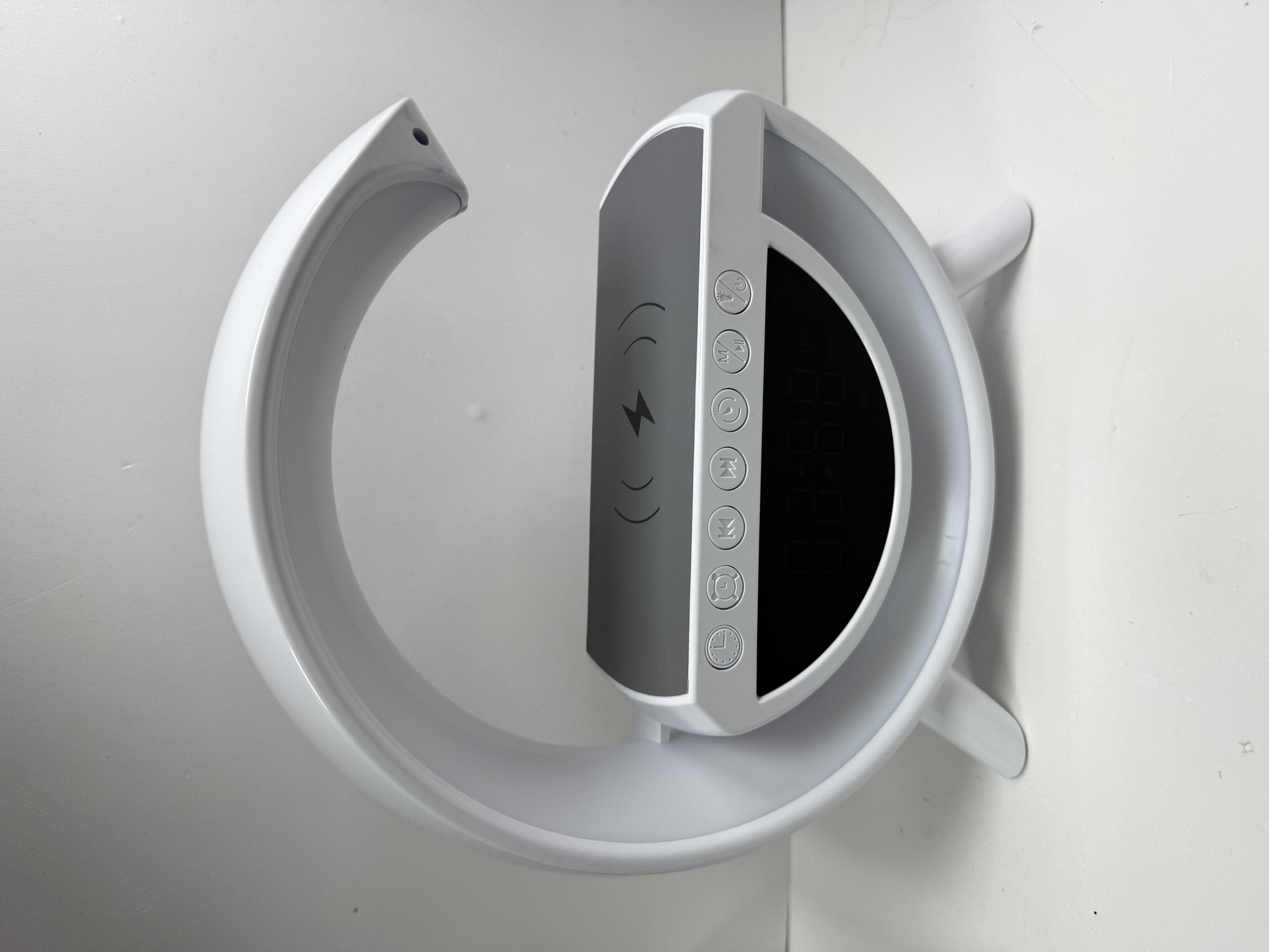 Product photo for half moon wireless charger speaker