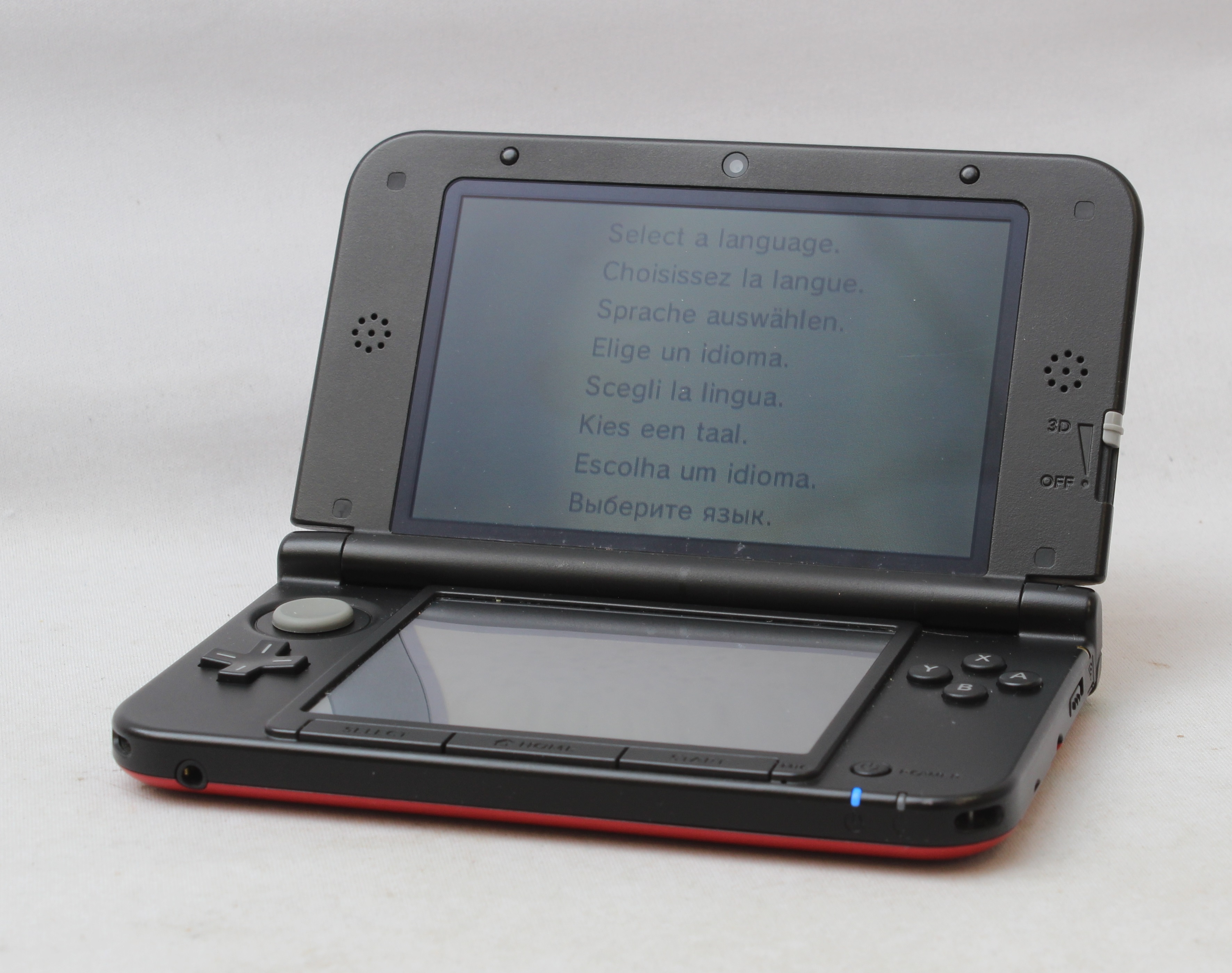 Product photo for Nintendo 3DS XL Handheld Games Console - Black & Red (B)