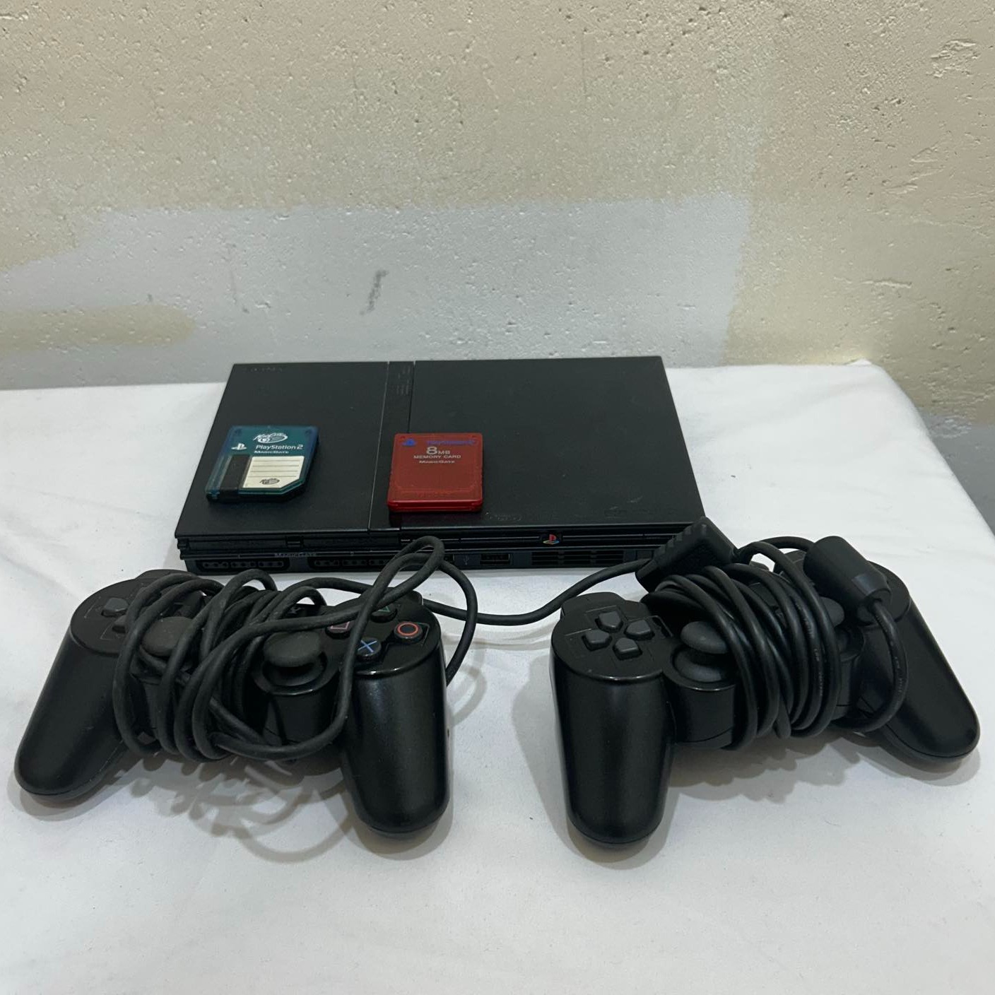 Product photo for Sony PS2 Slimline Console - 8mb memory card & 2 controllers
