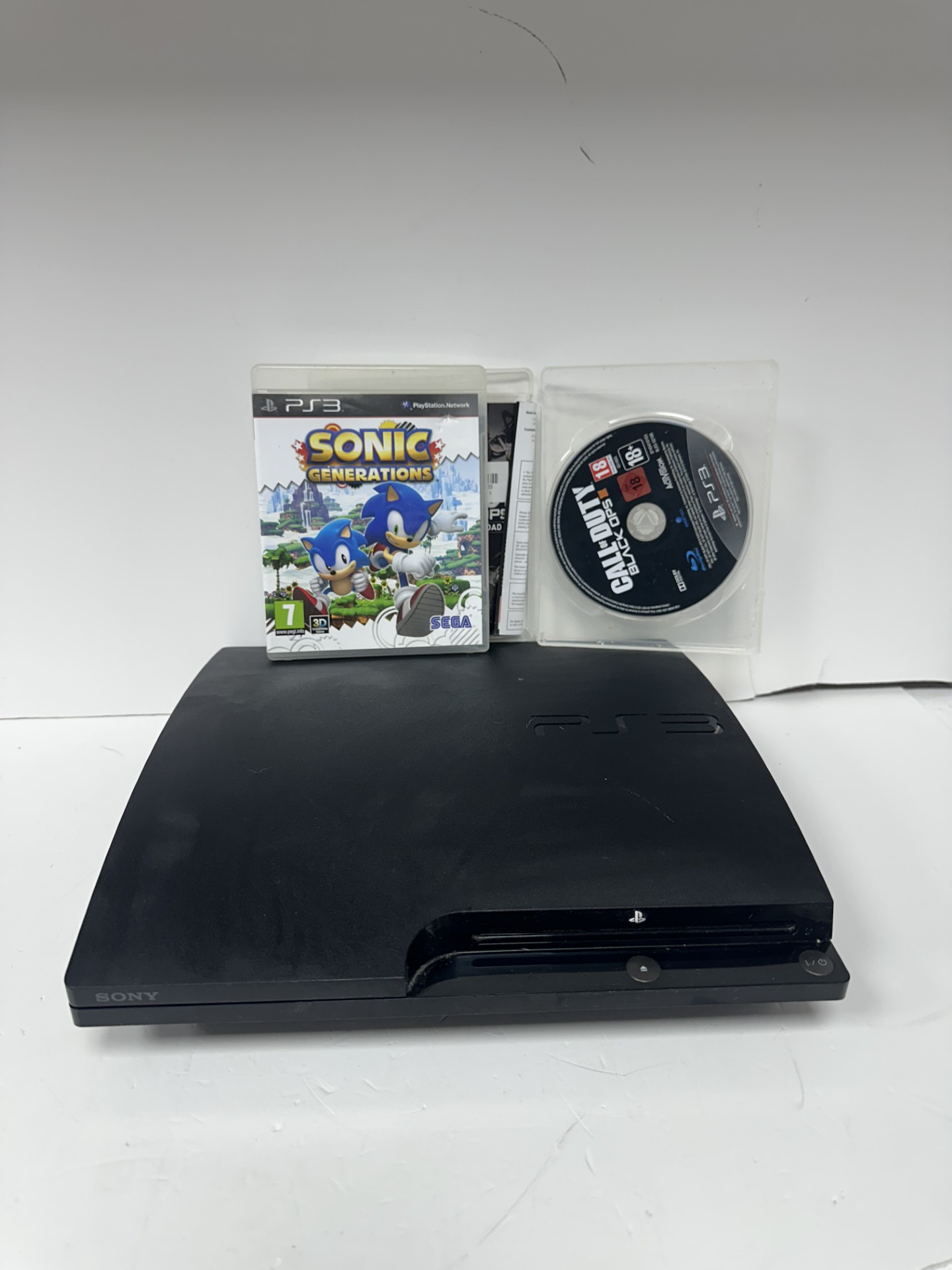 Product photo for PLAYSTATION 3 CONSOLES 320GB BLACK, COMES WITH SONIC GENERATIONS AND COD BLACK OPS III UNBOXED