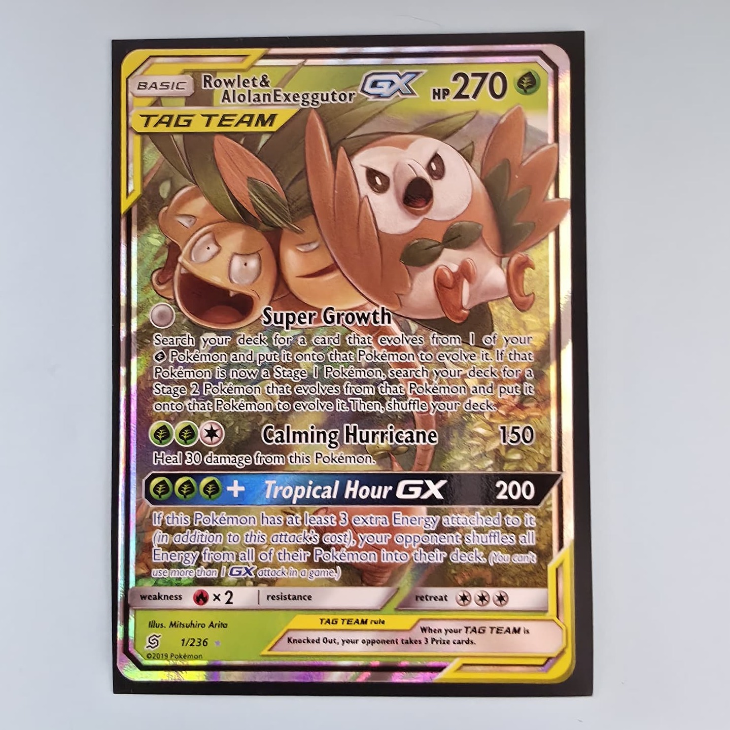 Product photo for Rowlet & Alolan Exeggutor GX – 1/236 Ultra Rare Unified Minds English