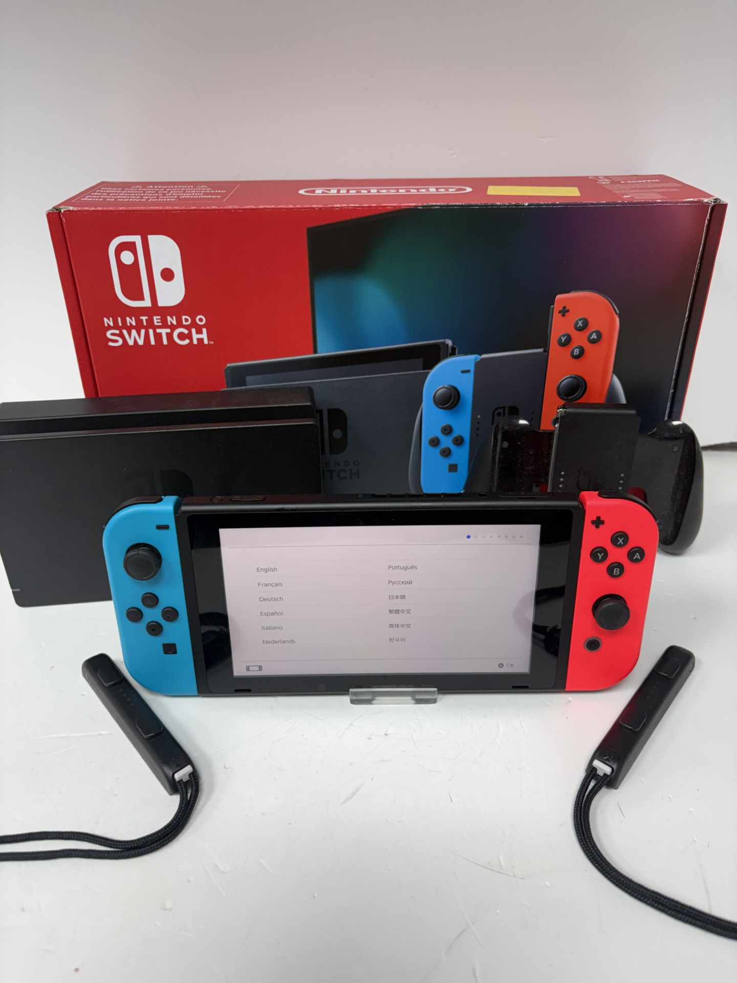 Product photo for NINTENDO  NINTENDO SWITCH CONSOLE 32GB SSD WITH RED AND BLUE JOY CONS ACCSESSORIES BOXED