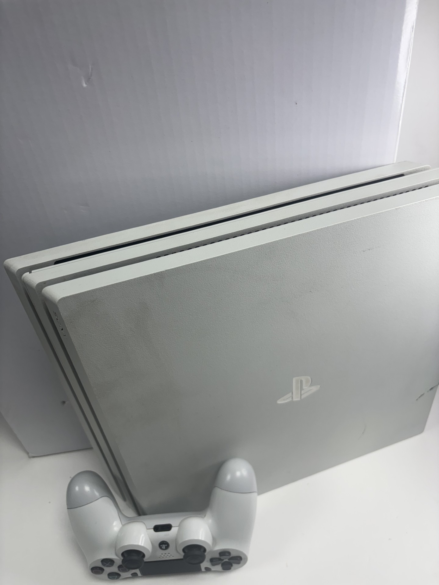 Product photo for PS4 PRO WHITE BOXED WITH CONTROLLER N LEADS