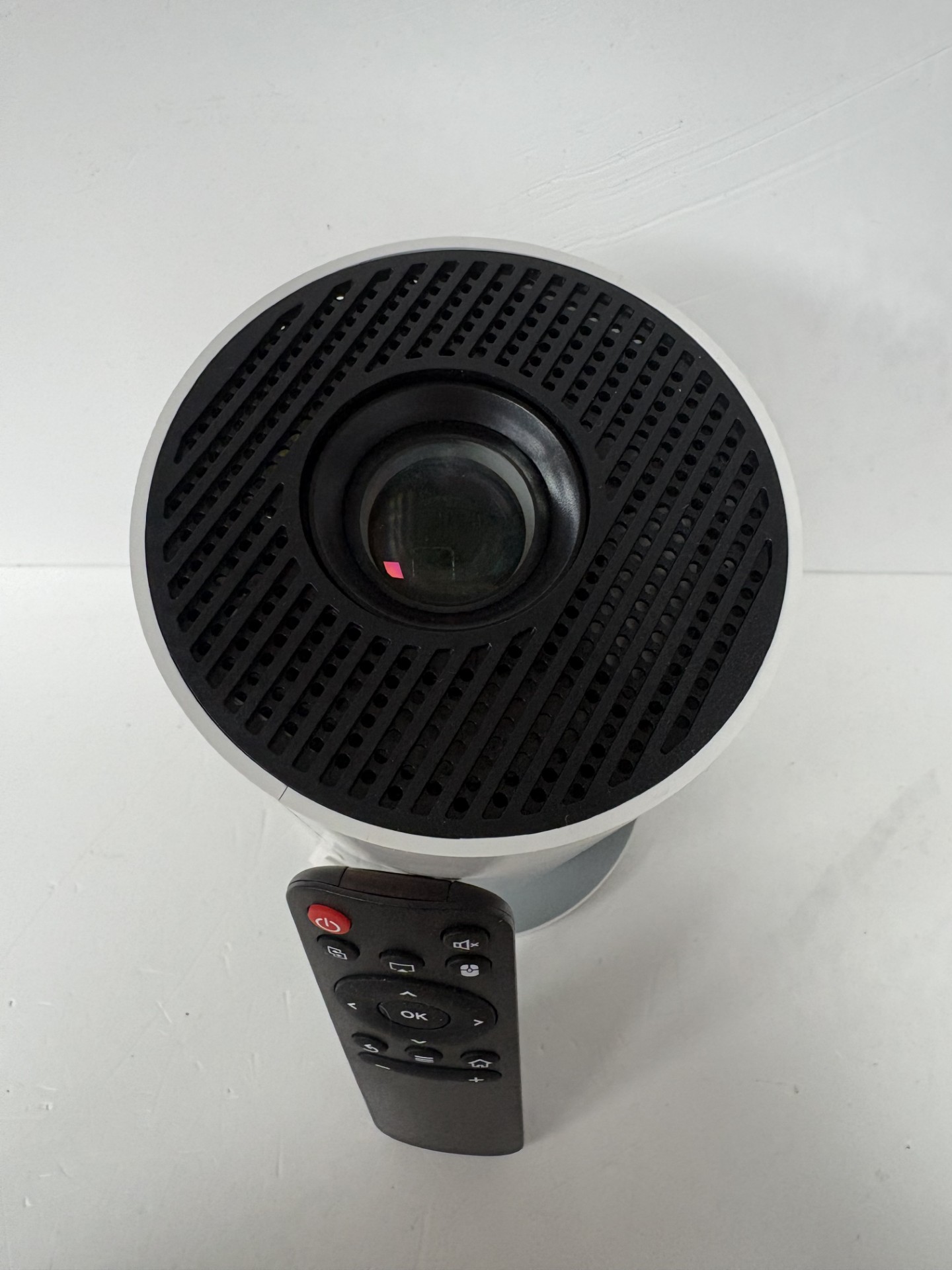 Product photo for hy300pro mini projector white with remote unboxed