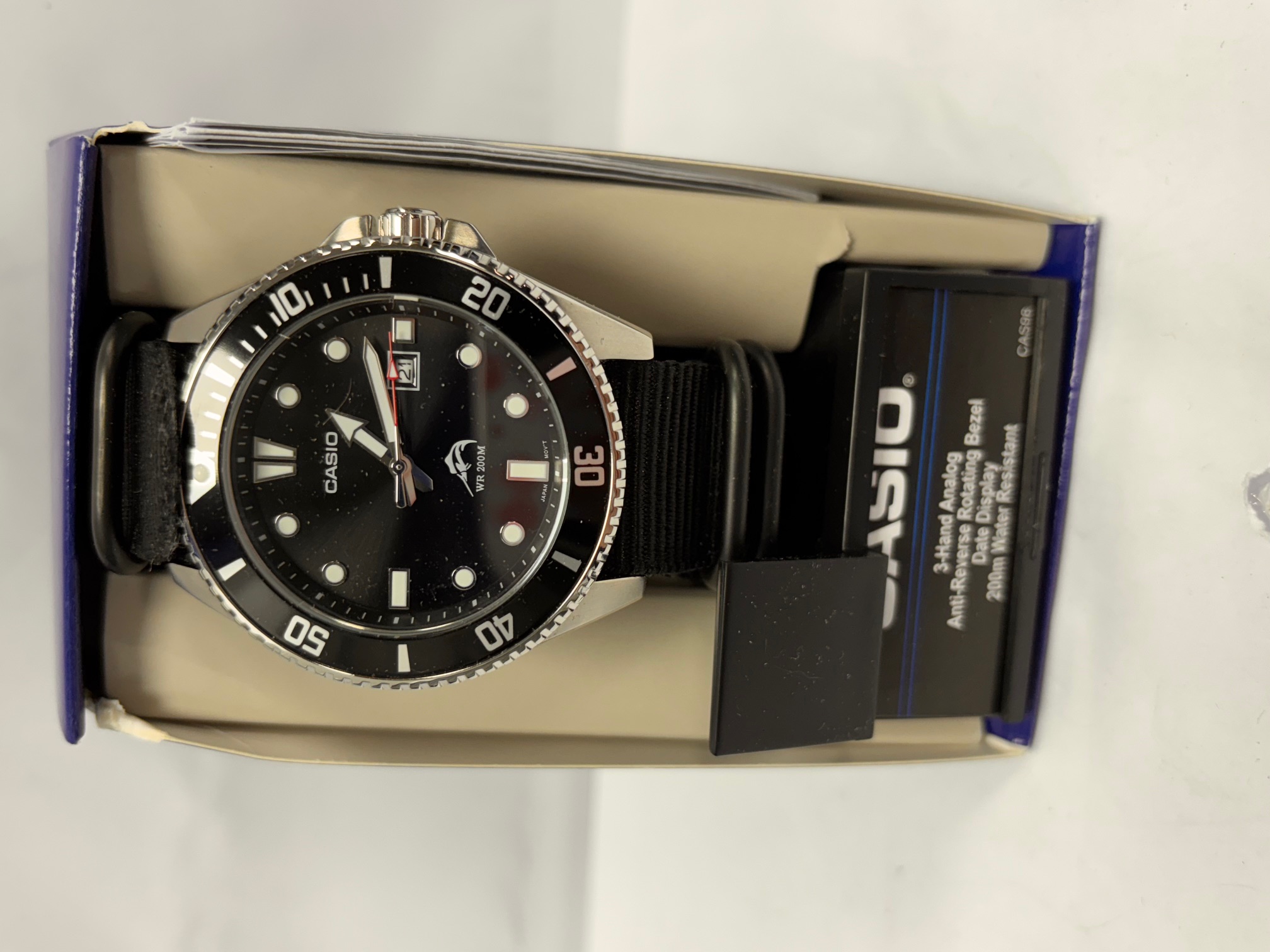 Product photo for casio watch white and blue box black fabric strap face