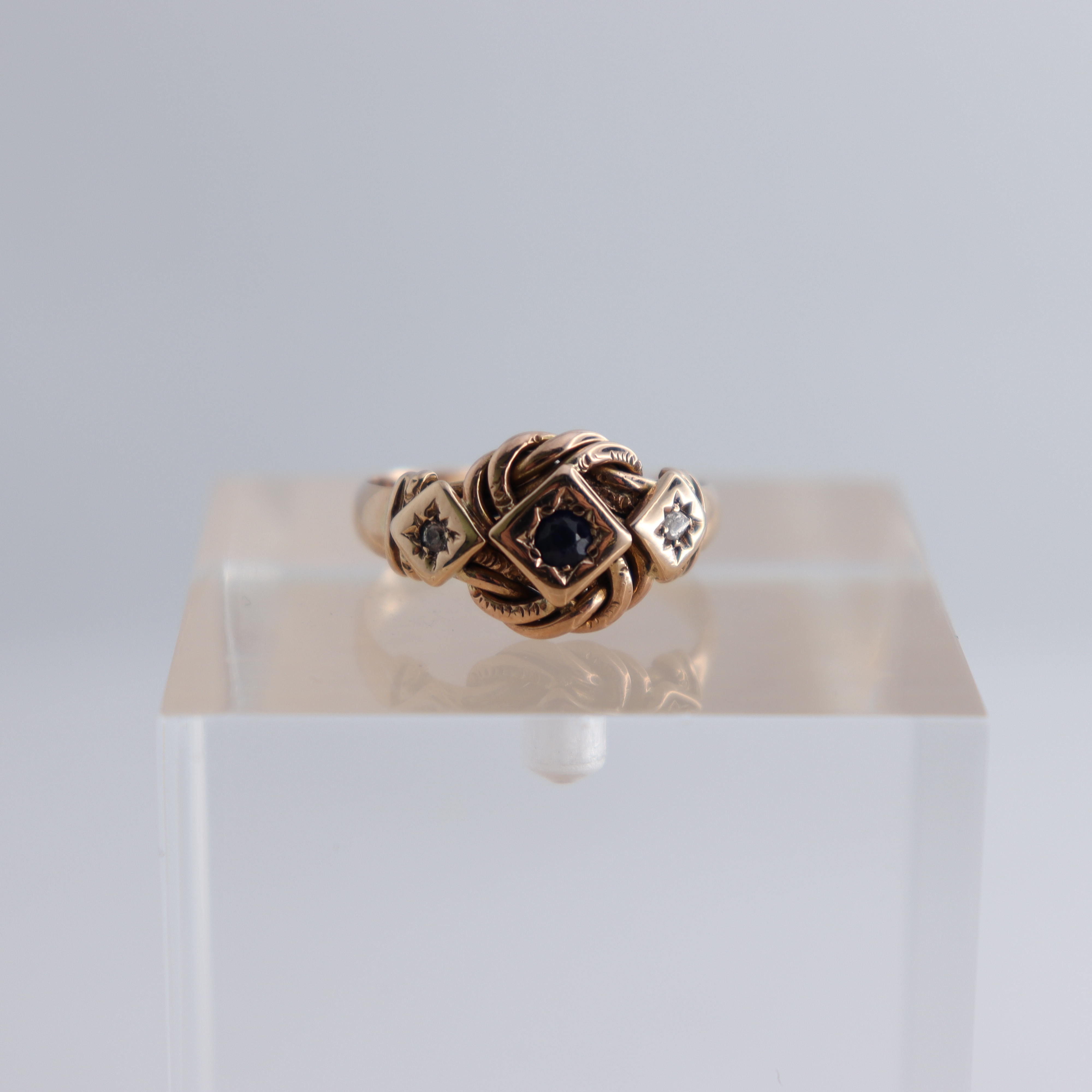 Product photo for Hallmarked 9ct Rose Gold Sapphire & Diamond Set Knot Ring