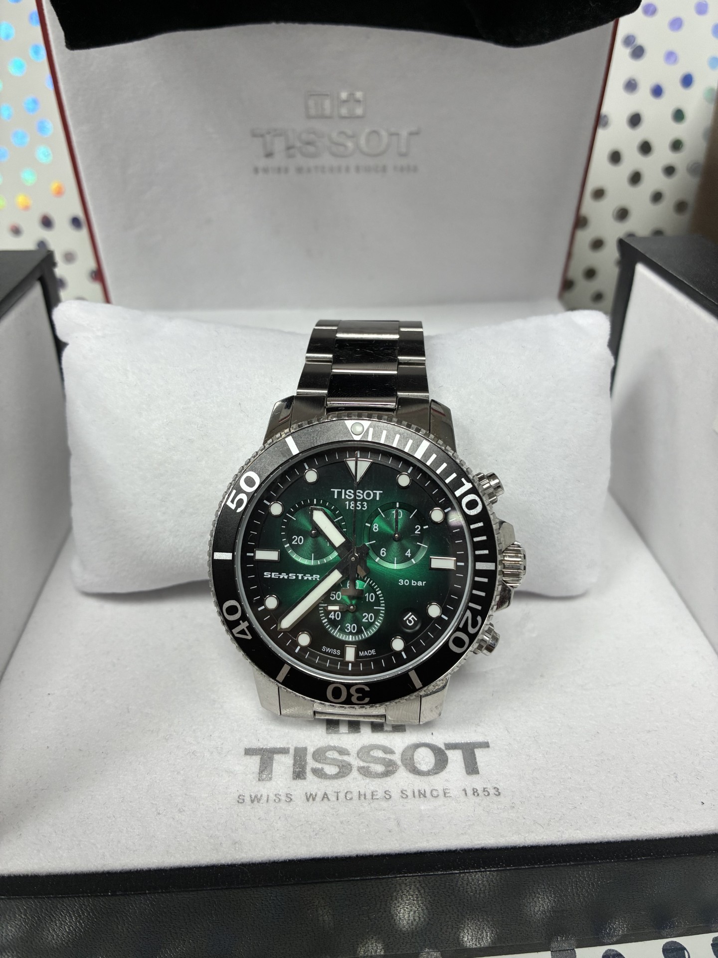Product photo for tissot silver and green watch boxed