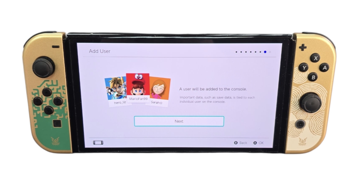 Product photo for Switch Console, 64GB OLED Legend of Zelda + Gold Joy-Con Boxed