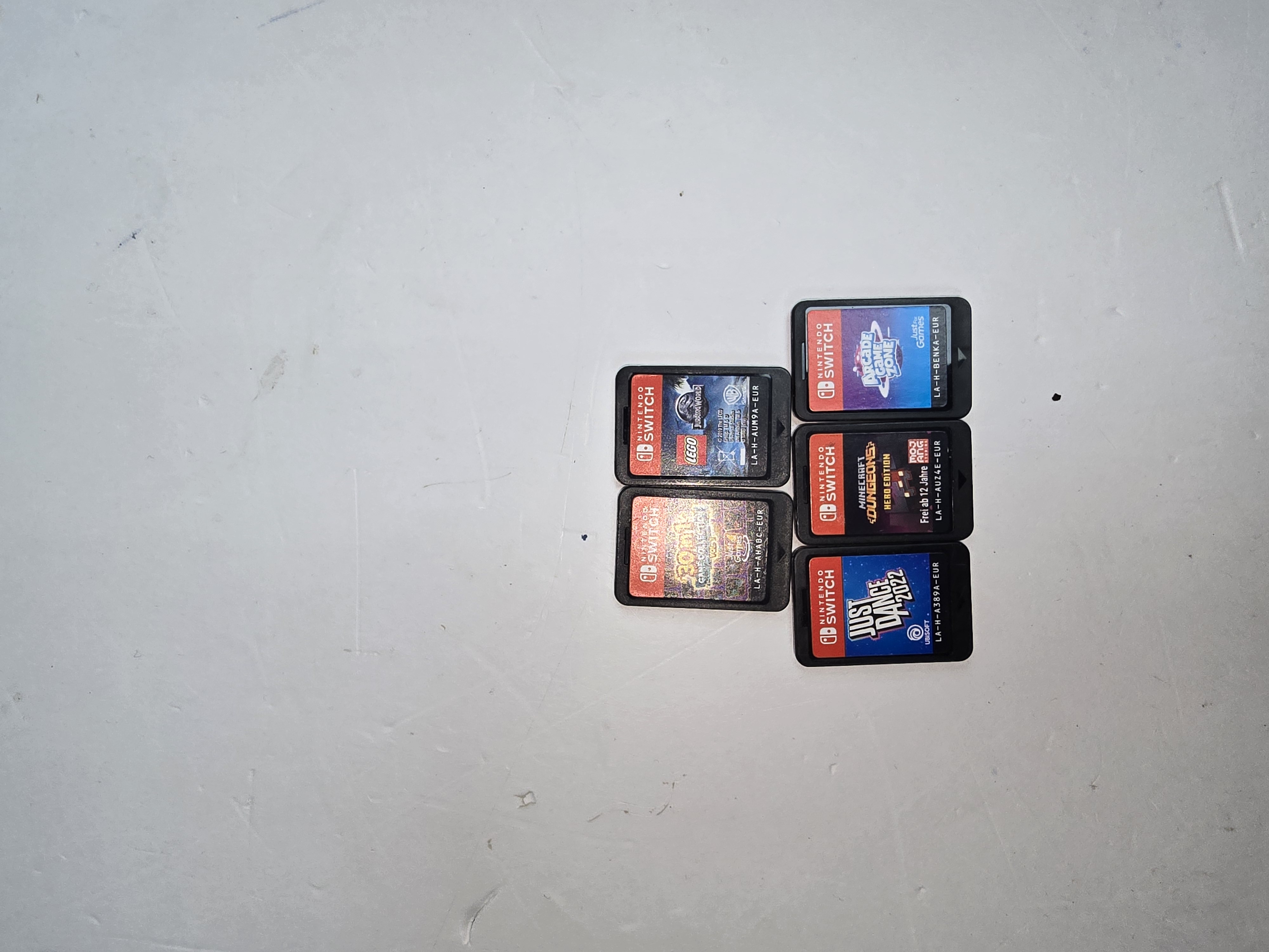 Product photo for LOOSE CARTRIDGE SWITCH GAME BUNDLE -30IN1 COLLECTION VOL 1 - LEGO JURRASSIC WORLD JUST DANCE 2022-MINECRAFT DUNGEONS HERD EDITION-ARCADE ZONE
