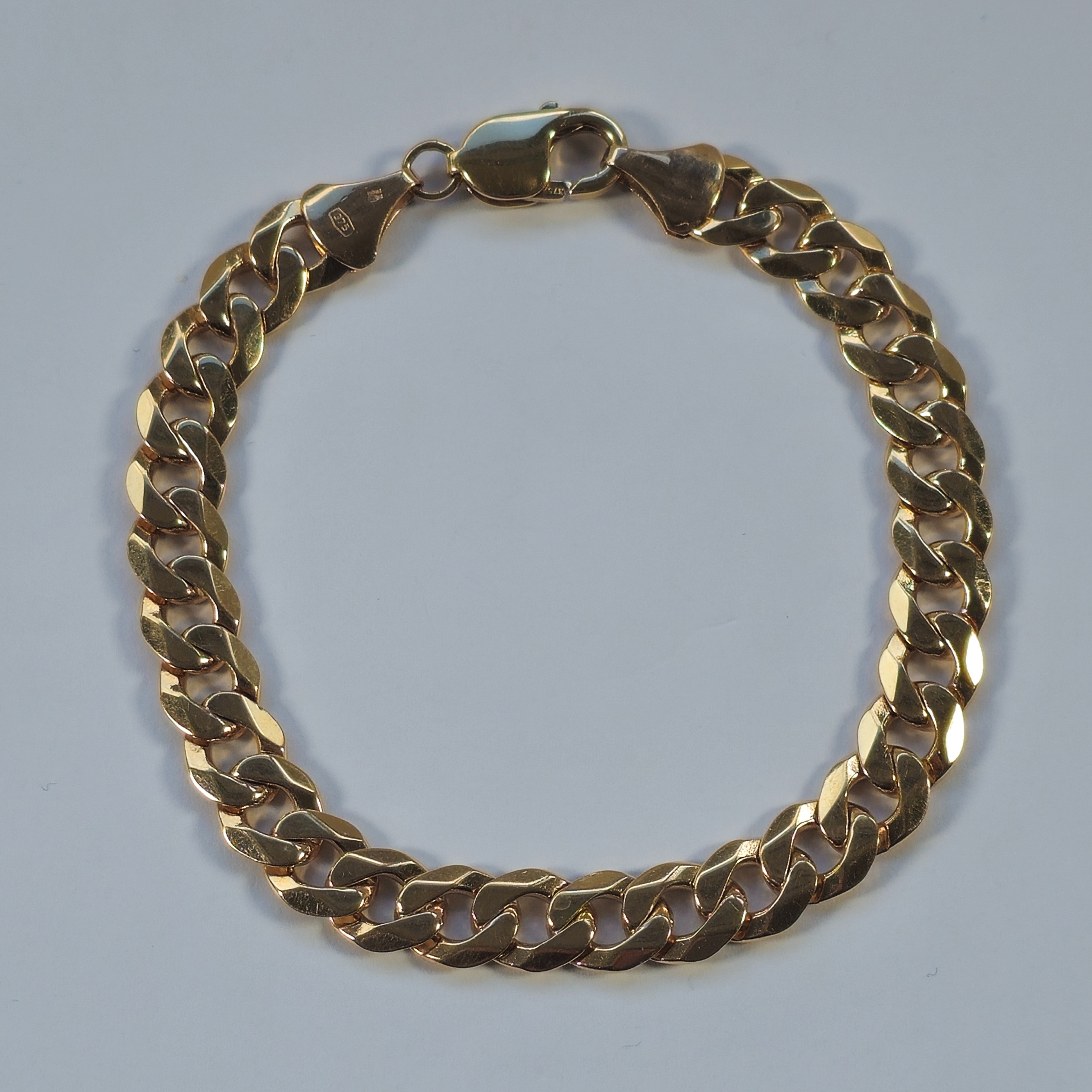 Product photo for 9ct Gold Curb Bracelet 8.4