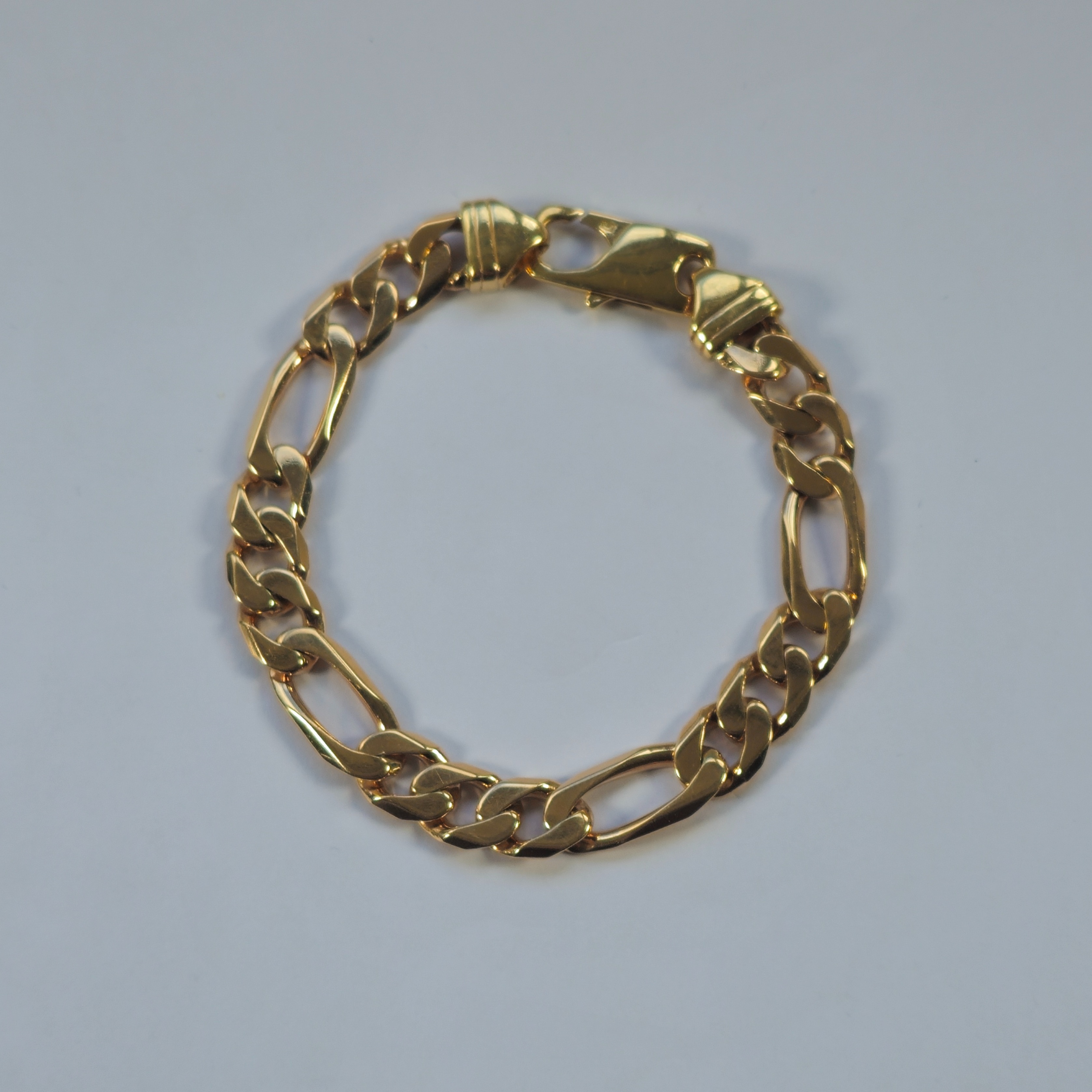 Product photo for 9ct Gold Figaro Bracelet 8.5